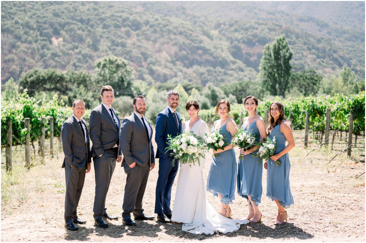 wedding party standing in venue