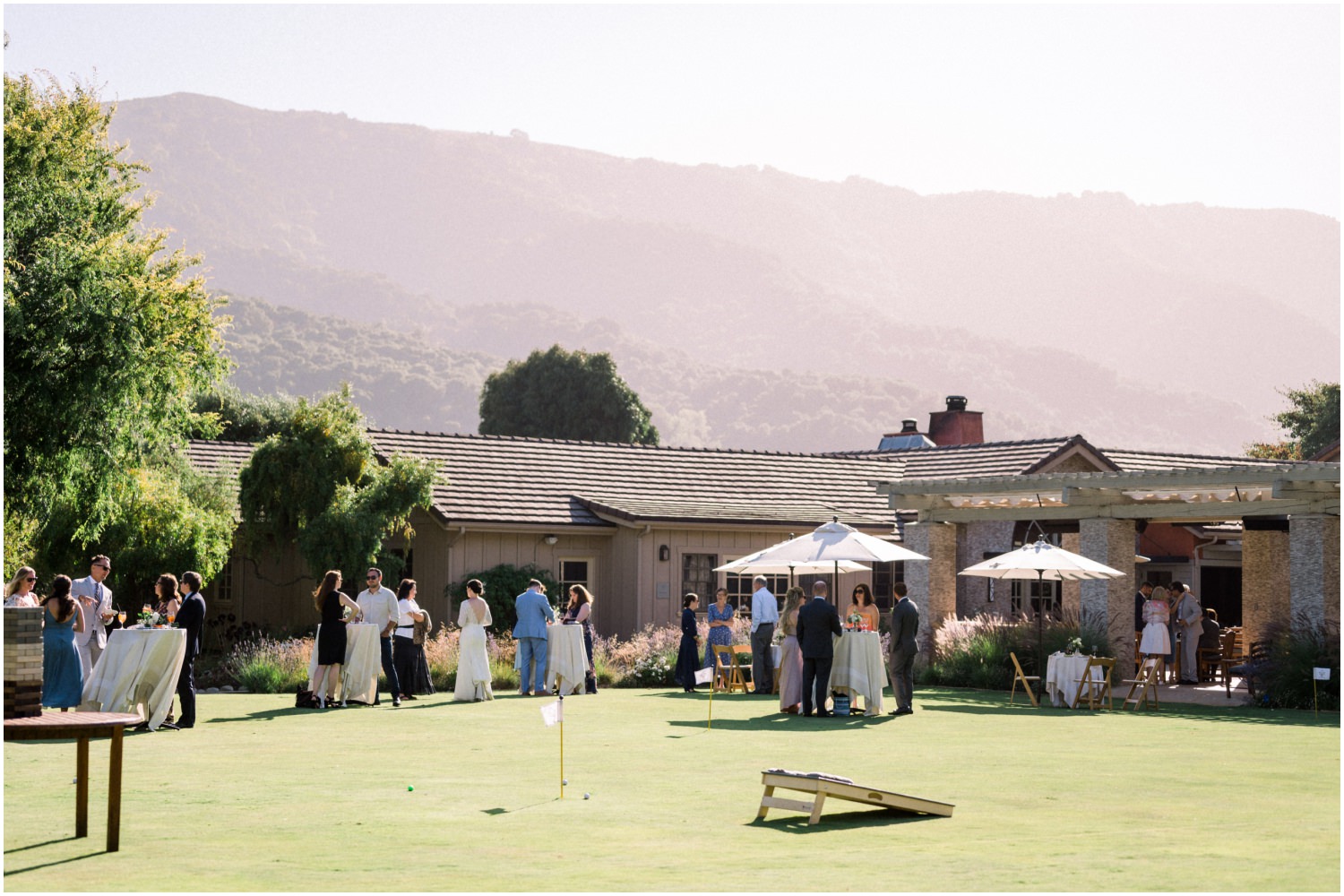people enjoying drinks and appetizers at a resort